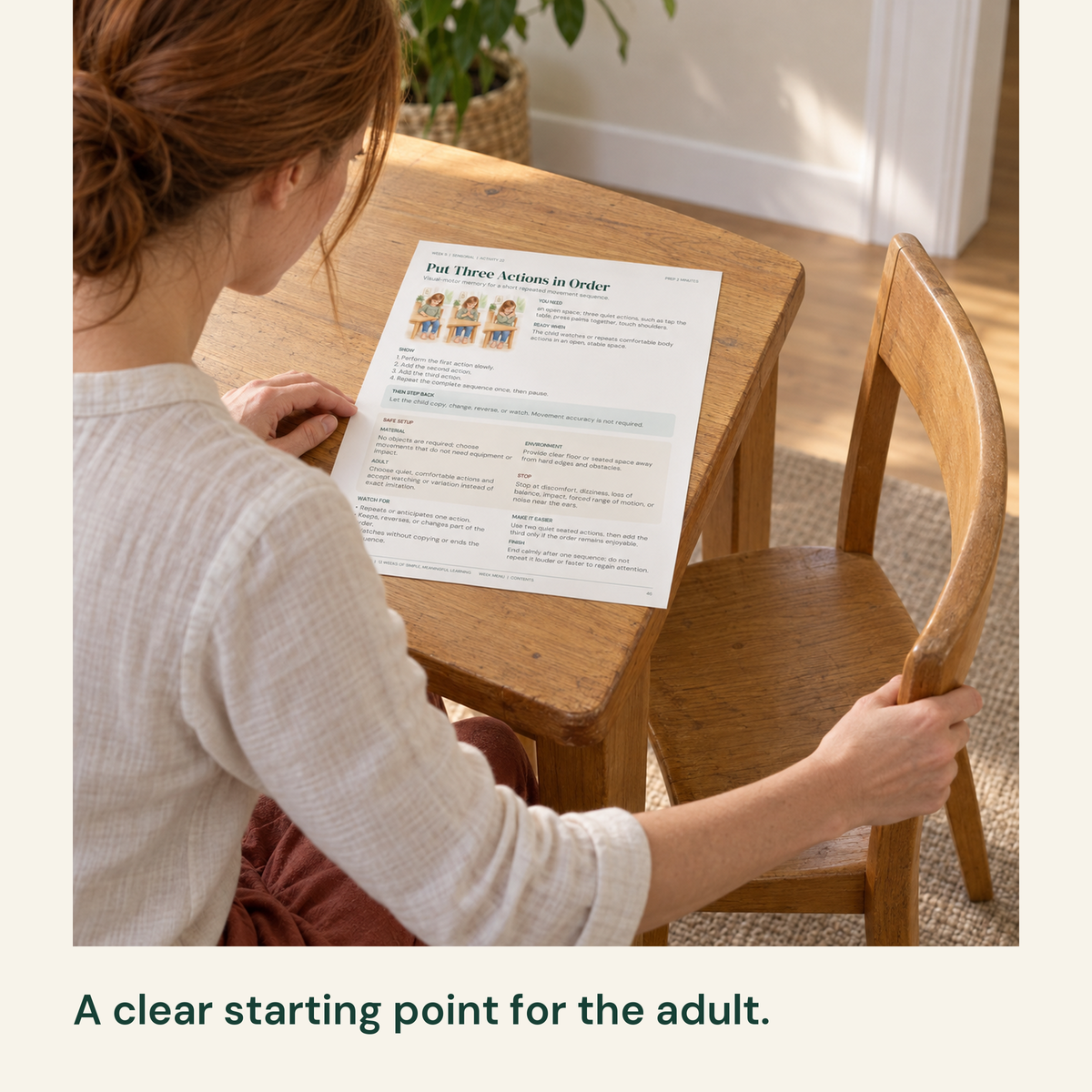 Mother reads the action guide and prepares an empty chair at the table.