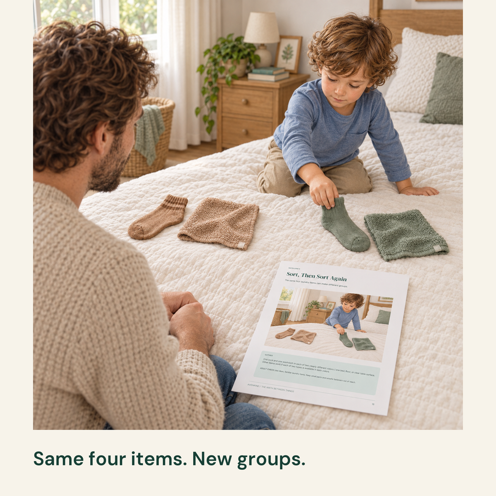 A child groups four laundry items by color while a parent consults the sorting guide.